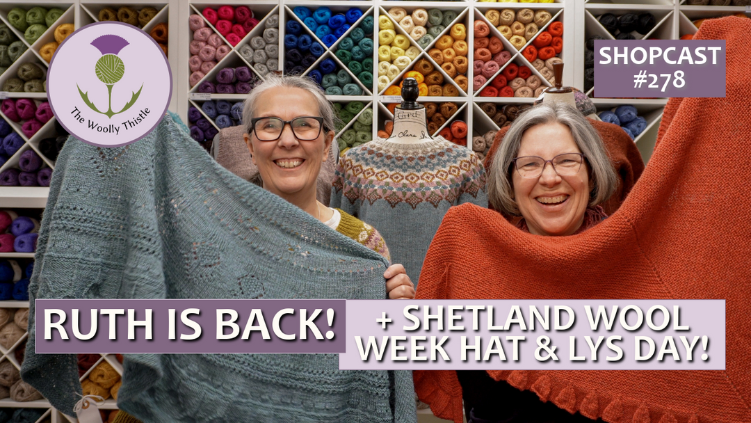 Shopcast #278 Ruth is Back! + Shetland Wool Week Hats & LYS Day! Text is over a photo of two women holding up handknit shawls. 