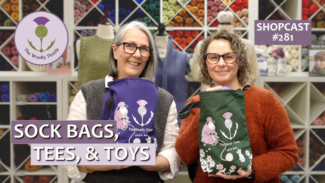 Hosts holding knitting bags and title: Shopcast #281: Sock Bags, Tees, & Toys