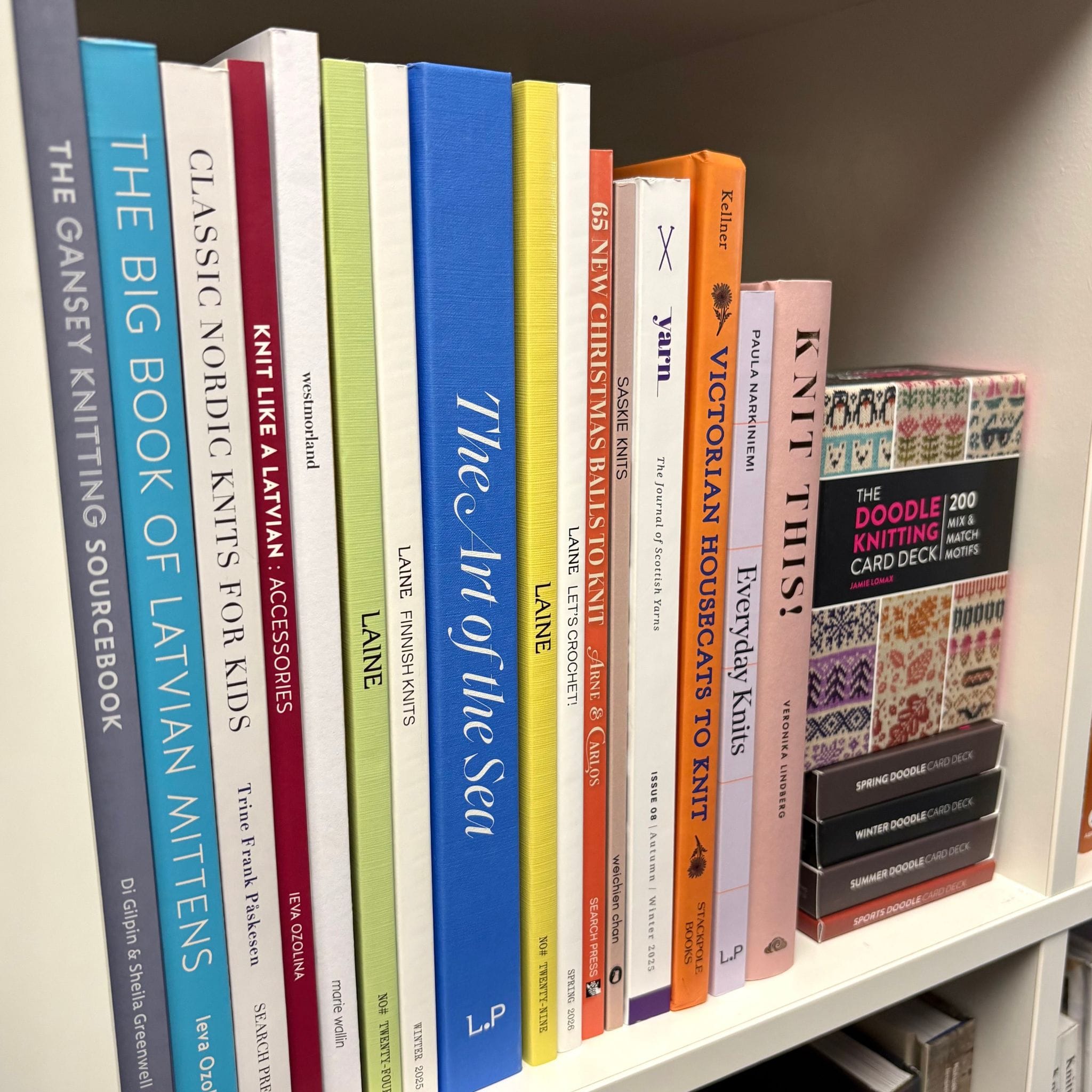 Knitting books on a shelf