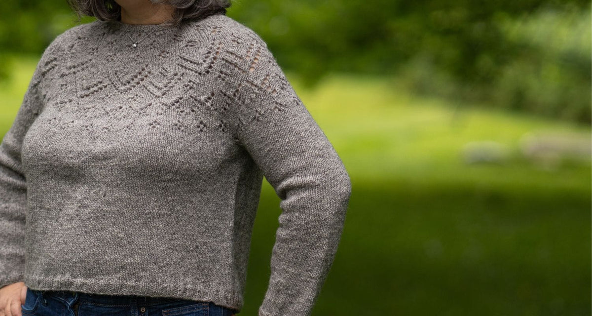Model wearing Beauly Sweater knit in Rauma Strikkegarn
