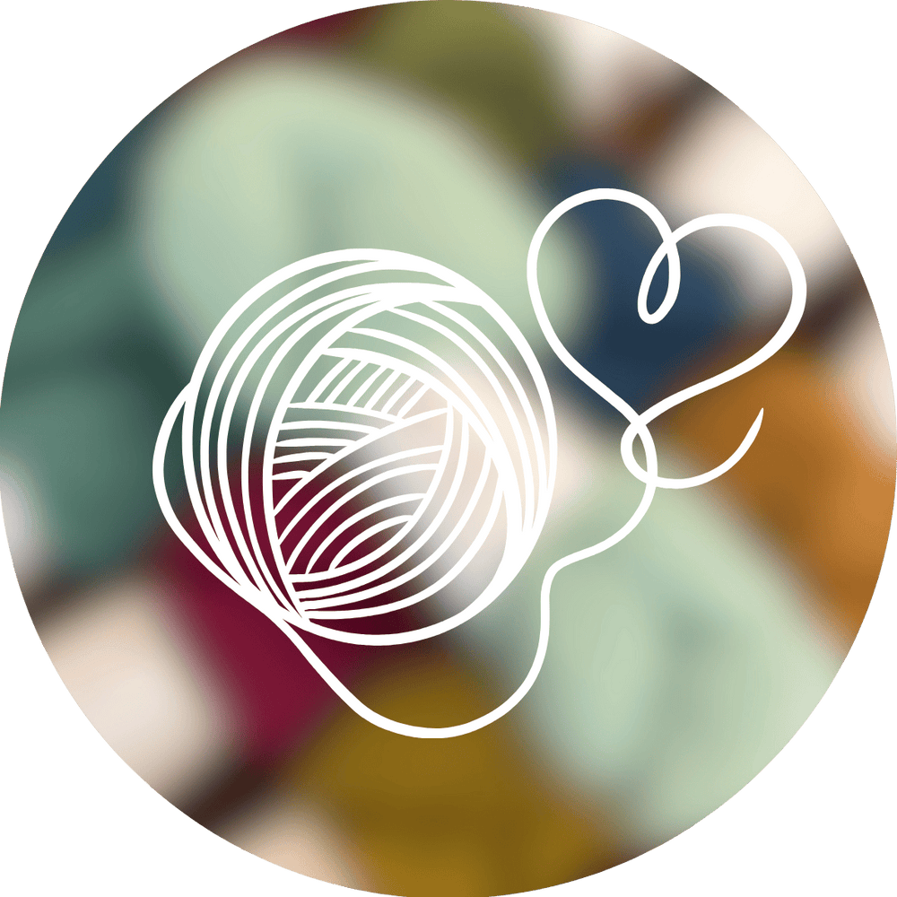 White outline of a yarn ball and heart on a colorful blurred background, representing a yarn which has not yet been announced.