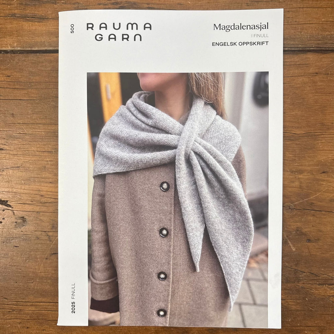 Rauma Garn pattern card cover for Magdalenasjal Shawl featuring a person wearing a gray scarf. 