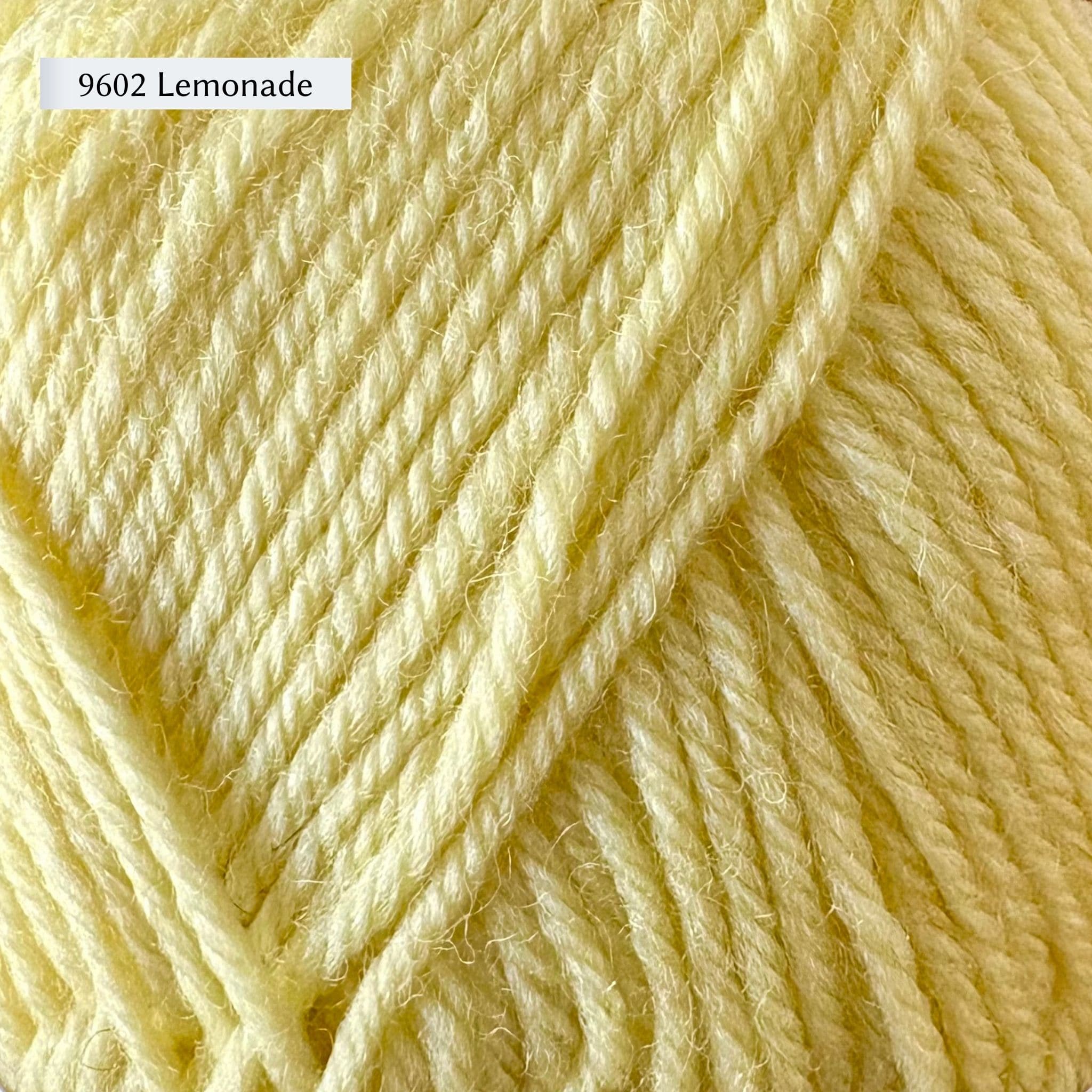Close-up of lemon-colored yarn with a label '9602 Lemonade'.
