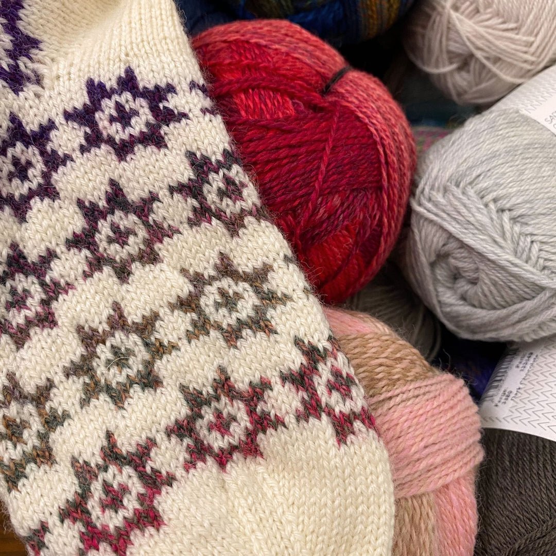 Under the Quilt Socks by Stone Knits in Sisu and Zauberball