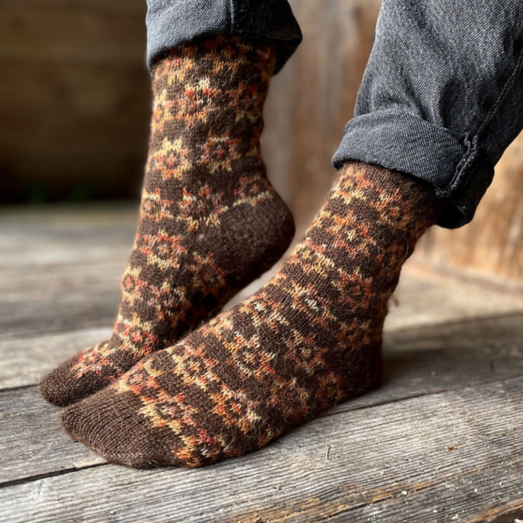 Under the Quilt Socks by Stone Knits in Sisu and Zauberball