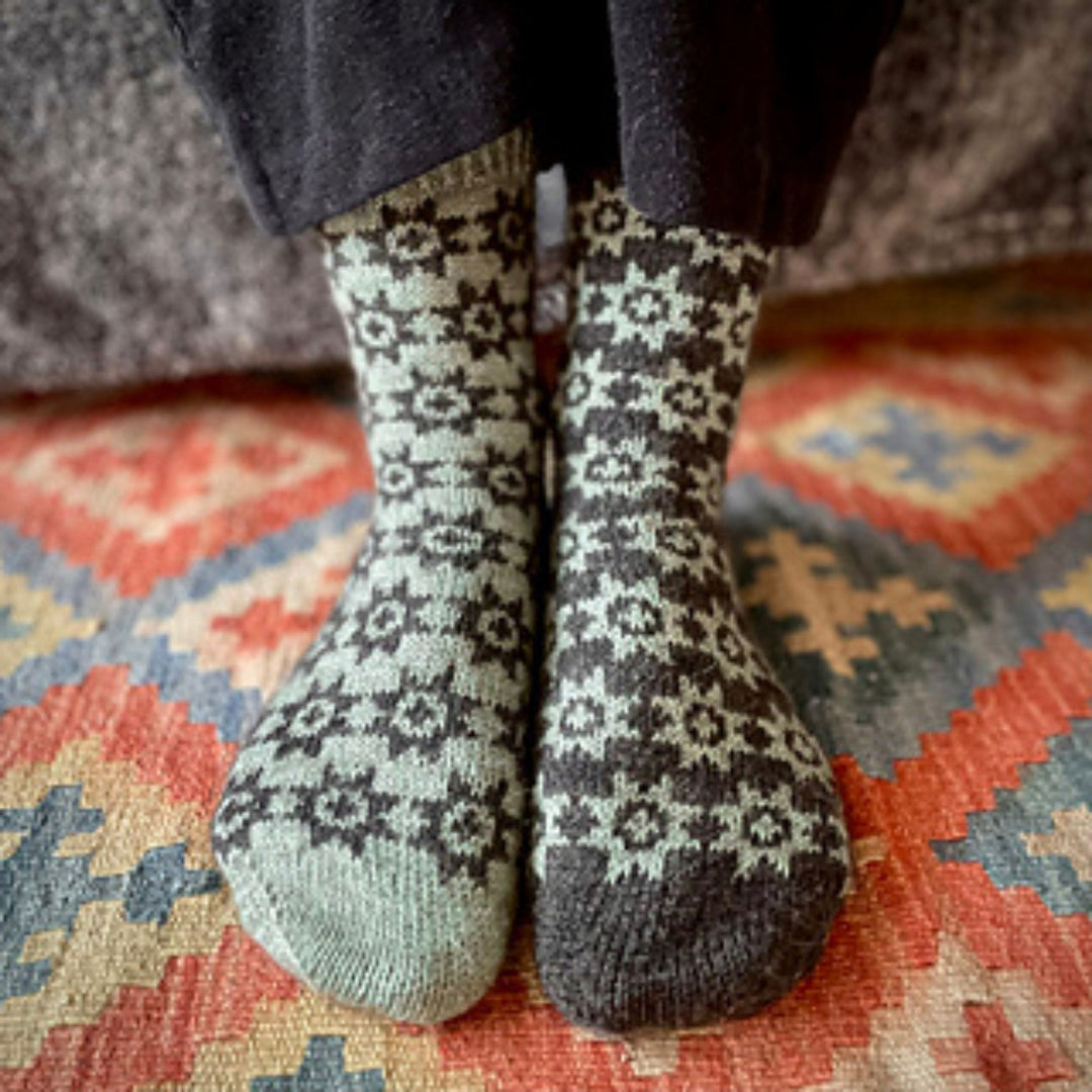 Under the Quilt Socks by Stone Knits in Sisu and Zauberball