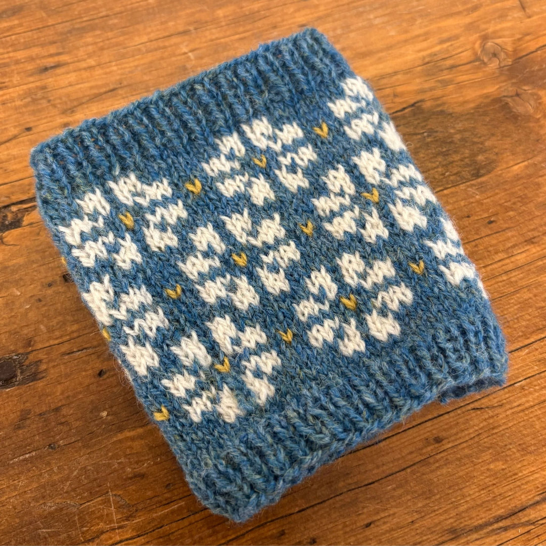 Flowers of Fortrose Coffee Sleeve by Jill Schroeder for The Woolly Thistle