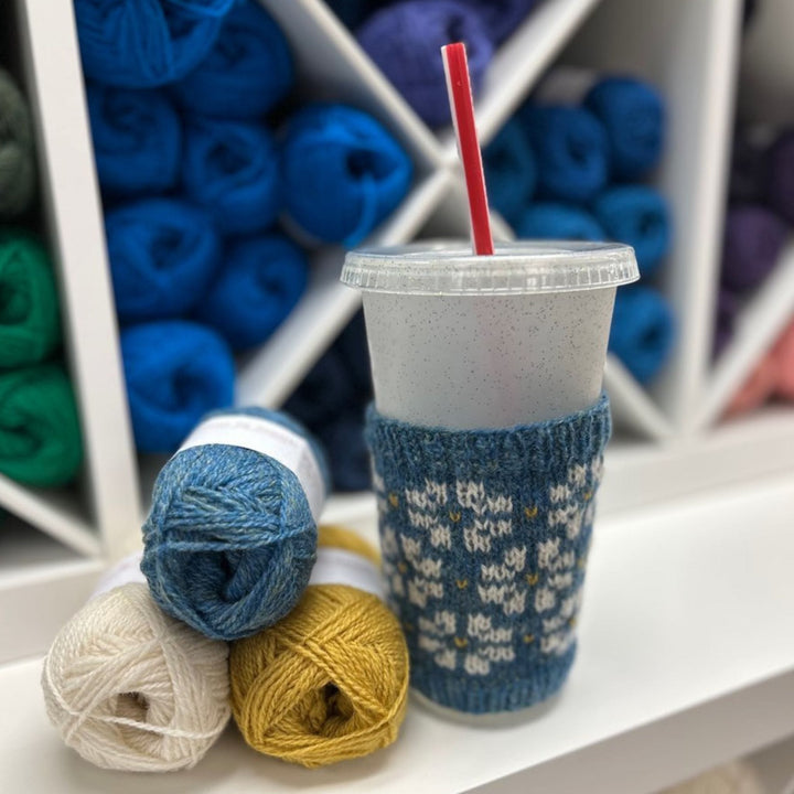 Flowers of Fortrose Coffee Sleeve by Jill Schroeder for The Woolly Thistle