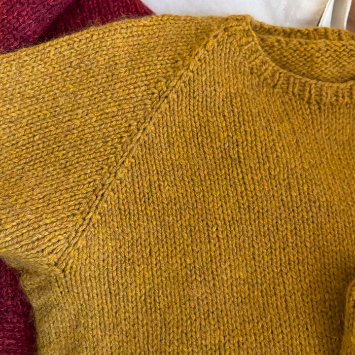Vanilla's Big Sister Sweater by Corinne Tomlinson in Harrisville Designs Highland & Rauma Plum