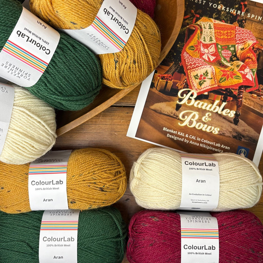 Baubles & Bows Blanket by Anna Nikipirowicz in ColourLab Aran