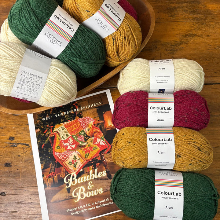 Baubles & Bows Blanket by Anna Nikipirowicz in ColourLab Aran