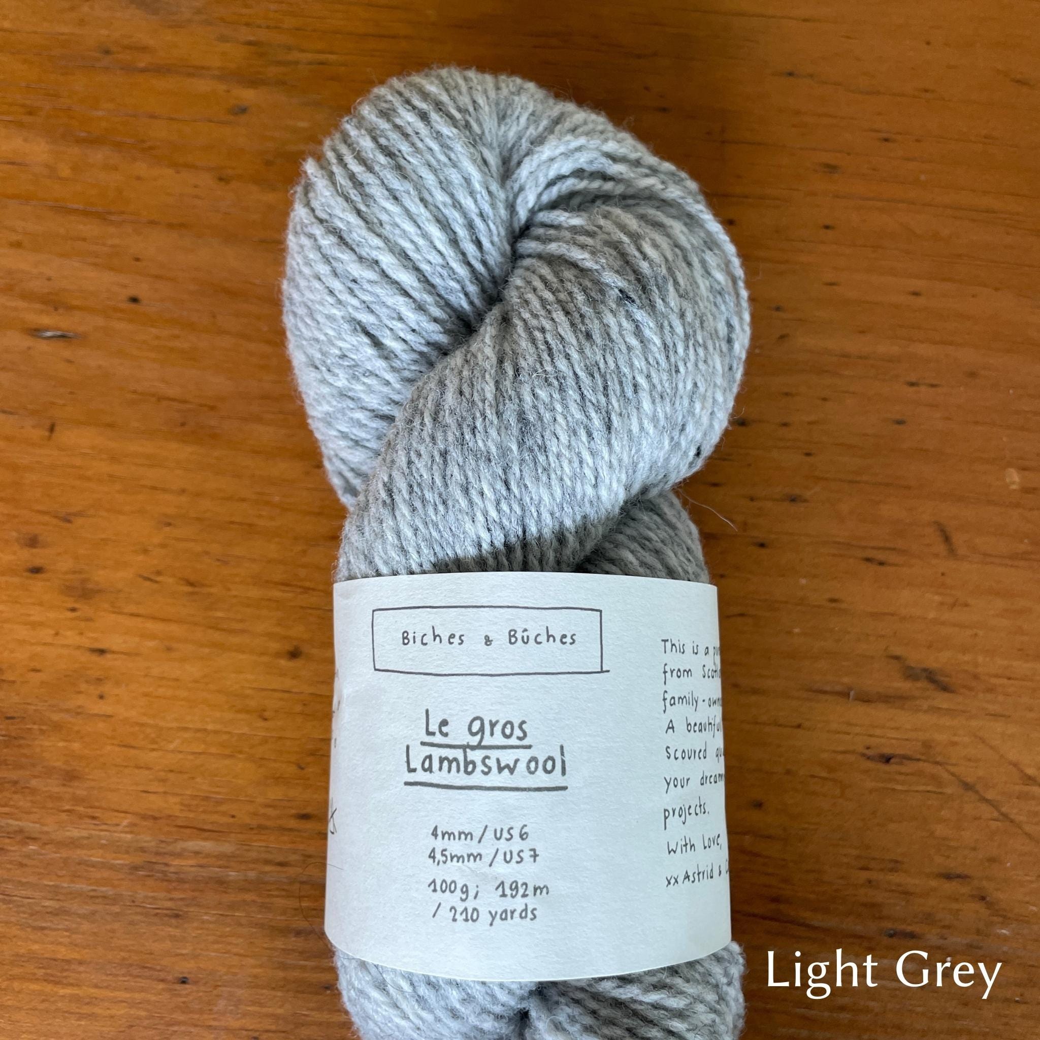 Skein of  Biches & Buches Les Gros Yarn in light grey.