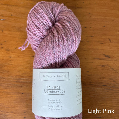 Skein of  Biches & Buches Les Gros Yarn in light pink.