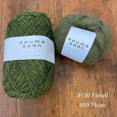 Ball of Rauma Finullgarn yarn in heathered green with coordinating Plum yarn 