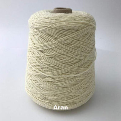 Cone of Frangipani 5-ply Guernsey Wool Yarn in colorway Aran.