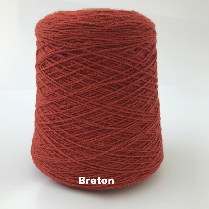 Cone of Frangipani 5-ply Guernsey Wool Yarn in colorway Breton.