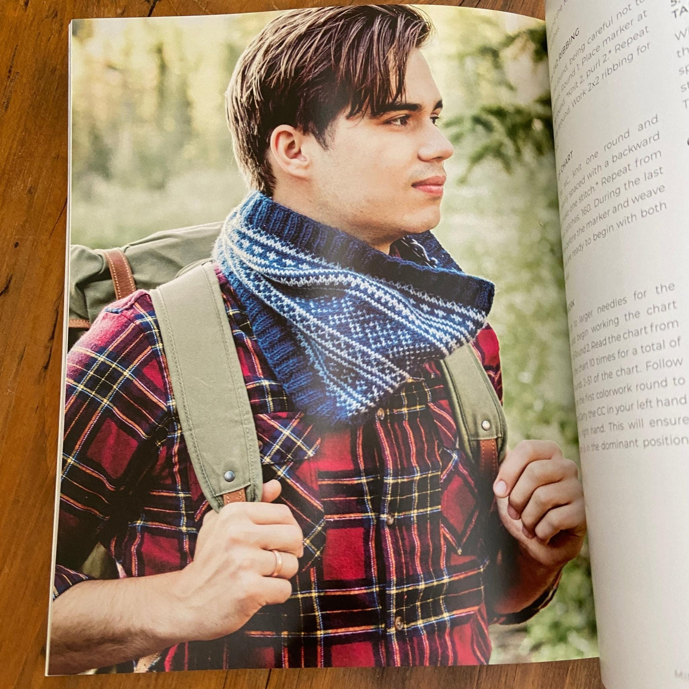 Page of Nordic Knitting Primer book with man in flannel wearing blue and cream colorwork cowl.
