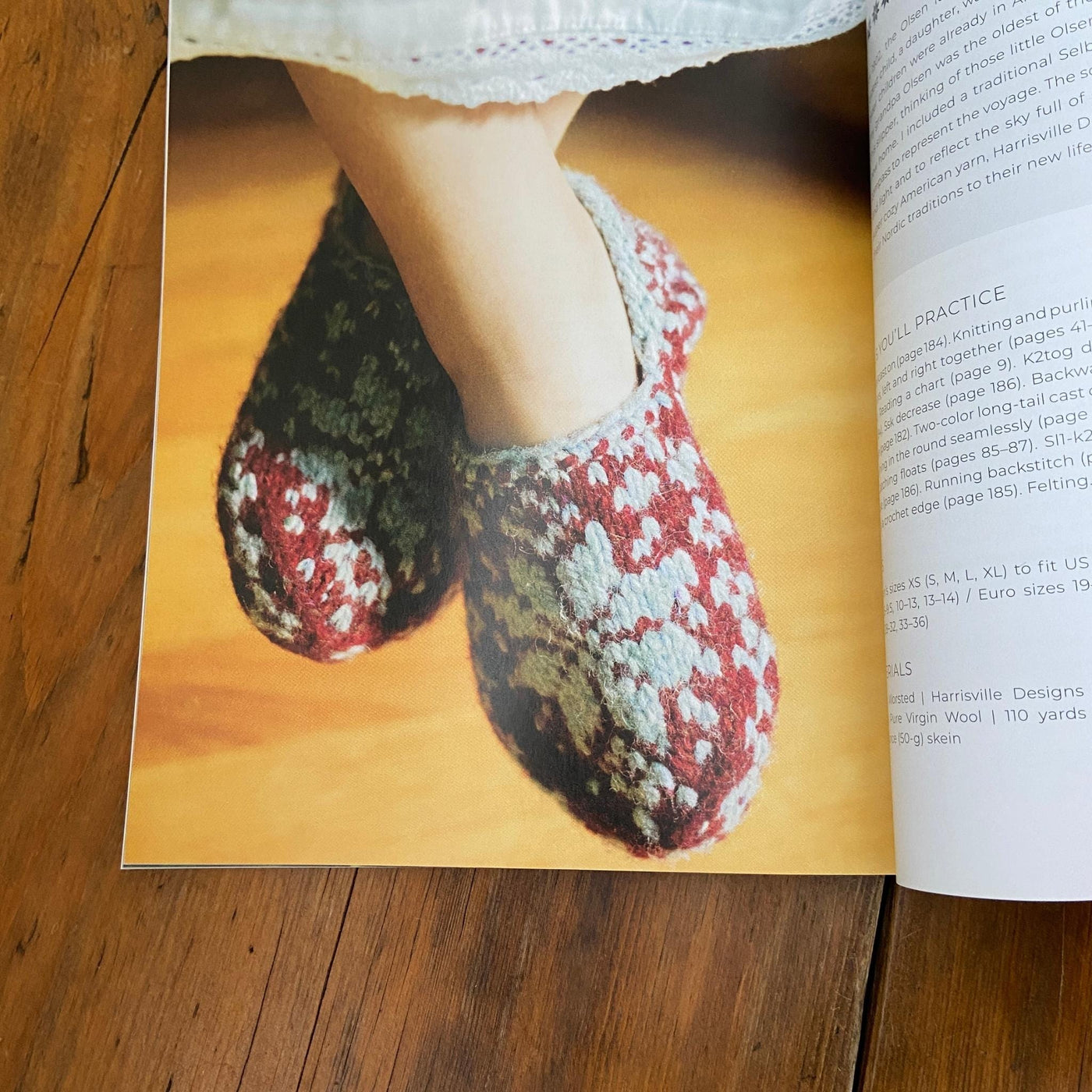 Page of Nordic Knitting Primer book looking down at feet in  colorwork using cream and burgundy