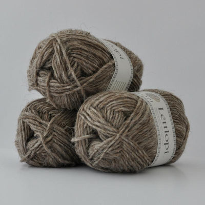 Ball of Lettlopi in colorway 0086 - light beige heather.