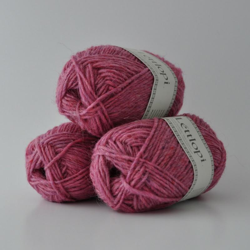 Ball of Lettlopi in colorway 1412 - pink heather.