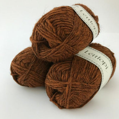 Ball of Lettlopi in colorway 9427 - rust heather.