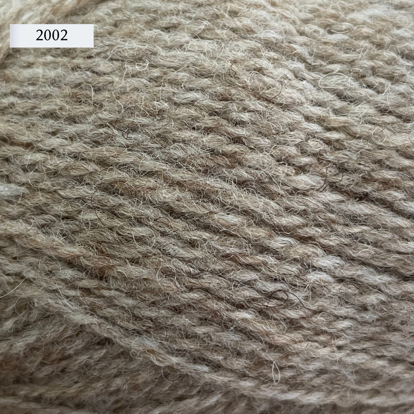 Jamieson & Smith Shetland Supreme, a fingering weight wool yarn, in color 2002, Mooskit, a light tan