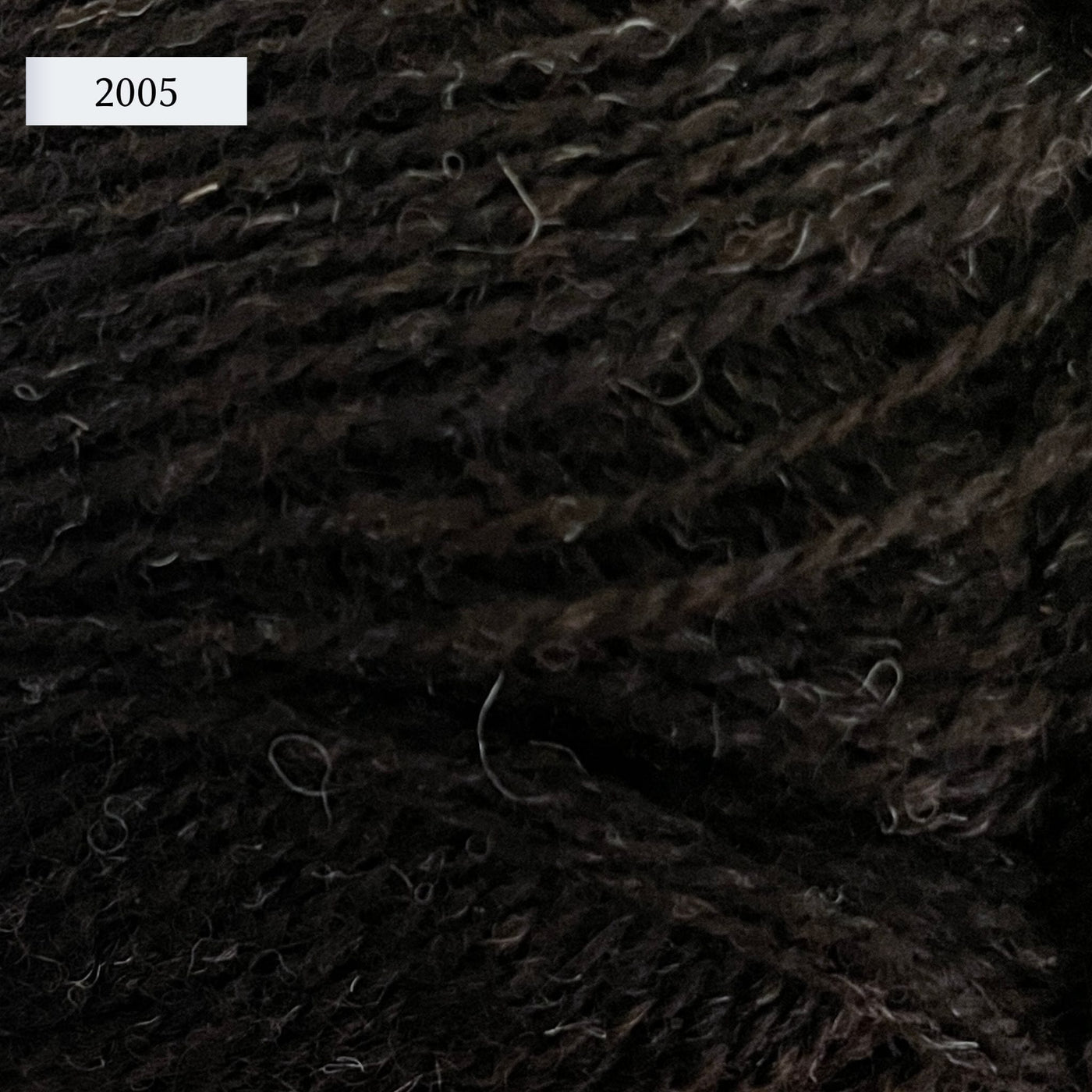 Jamieson & Smith Shetland Supreme, a fingering weight wool yarn, in color 2005, Shetland Black, a very dark brown/black