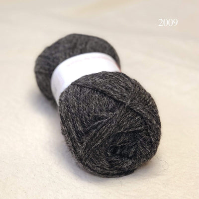 A ball of Jamieson & Smith Shetland Supreme, a fingering weight wool yarn, in color 2009, Yuglet, a medium grey