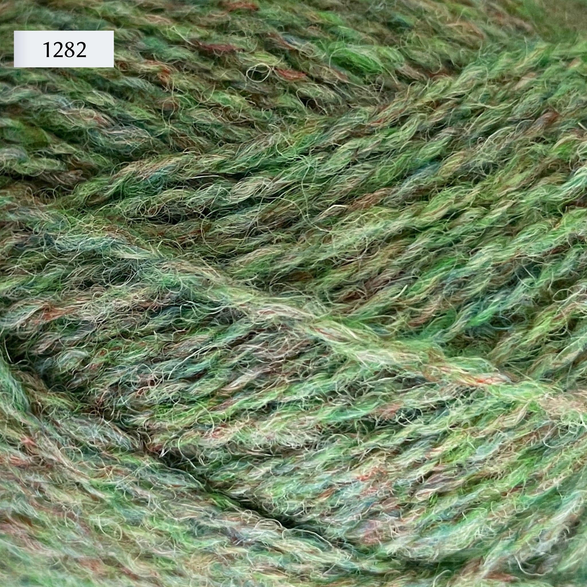 Jamieson & Smith 2ply Jumper Weight, light fingering weight yarn, in color 1282, a light grass green with heathered tans