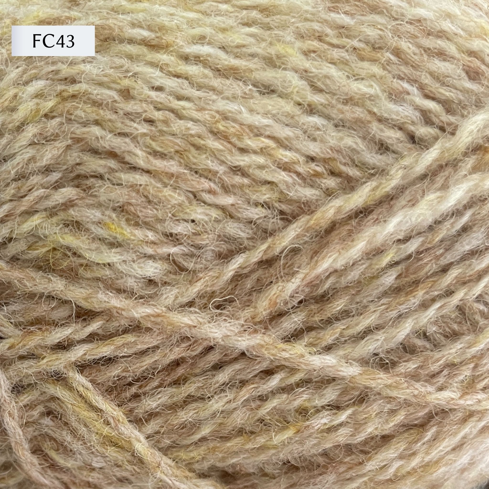 Jamieson & Smith 2ply Jumper Weight, light fingering weight yarn, in color FC43, a light heathered cream-yellow