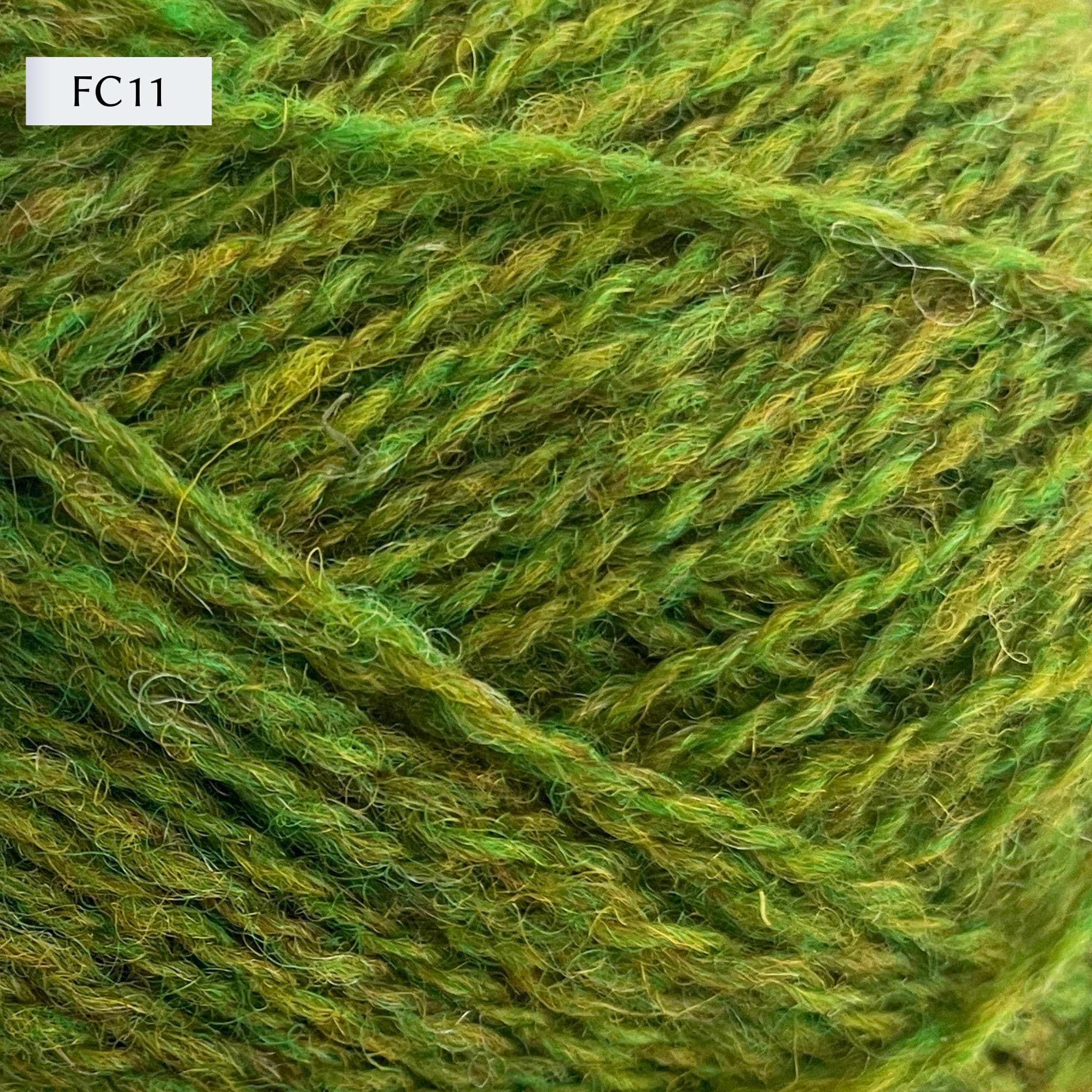 Jamieson & Smith 2ply Jumper Weight, light fingering weight yarn, in color FC11, a heathered yellow-green