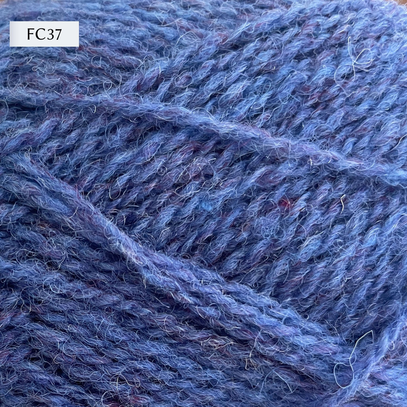Jamieson & Smith 2ply Jumper Weight, light fingering weight yarn, in color FC37, a heathered cornflower blue