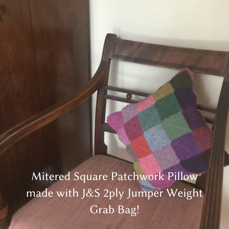 Mitered Square Patchwork Pillow made with Jamieson & Smith 2 ply Jumper Weight Yarn grab bag.