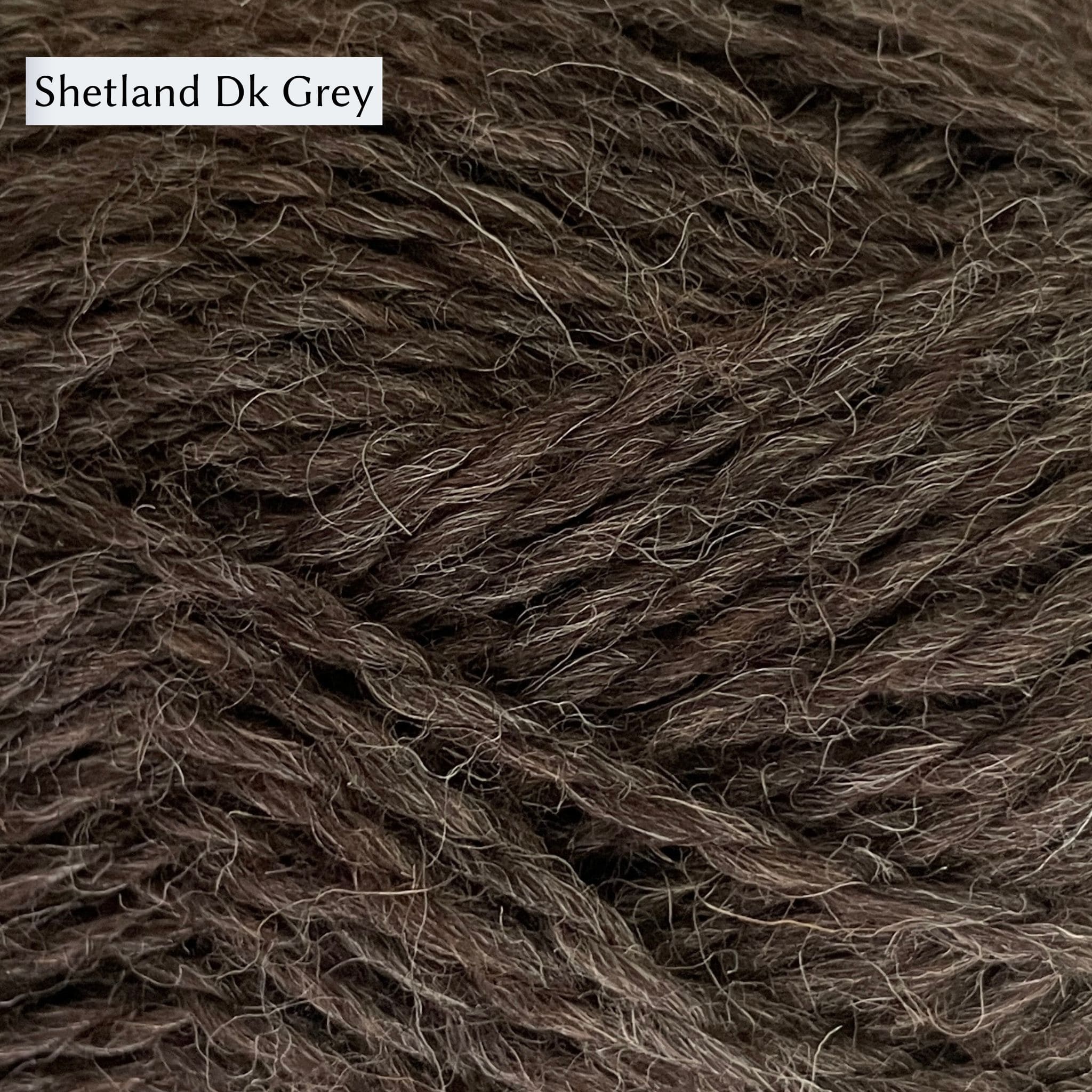 Jamieson & Smith Aran Worsted Yarn close up photo of Shetlang Dk Grey Colorway which is a dark brown color.