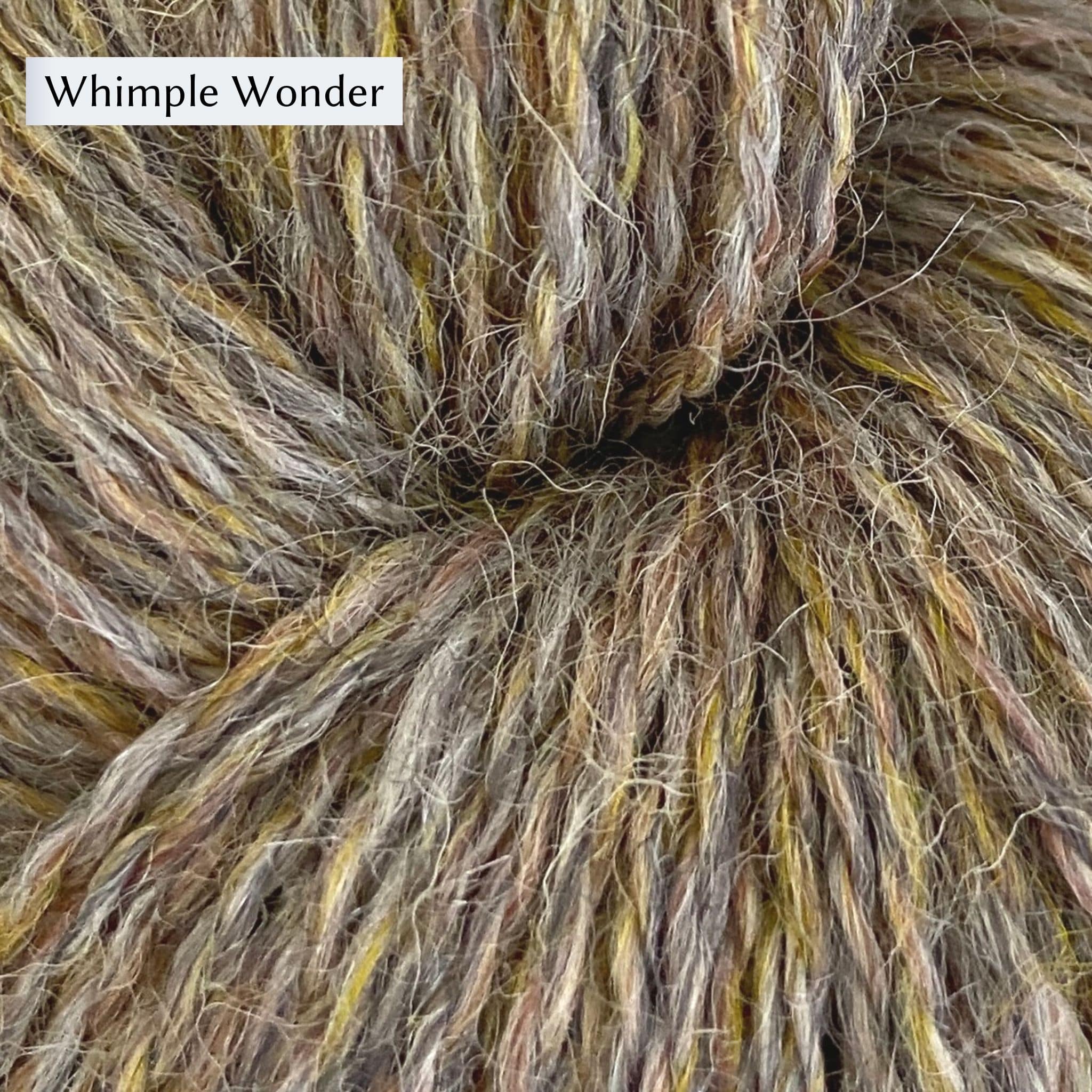 John Arbon Appledore DK, a DK weight British yarn, in color Whimple Wonder, a grey with yellow and brown heathering