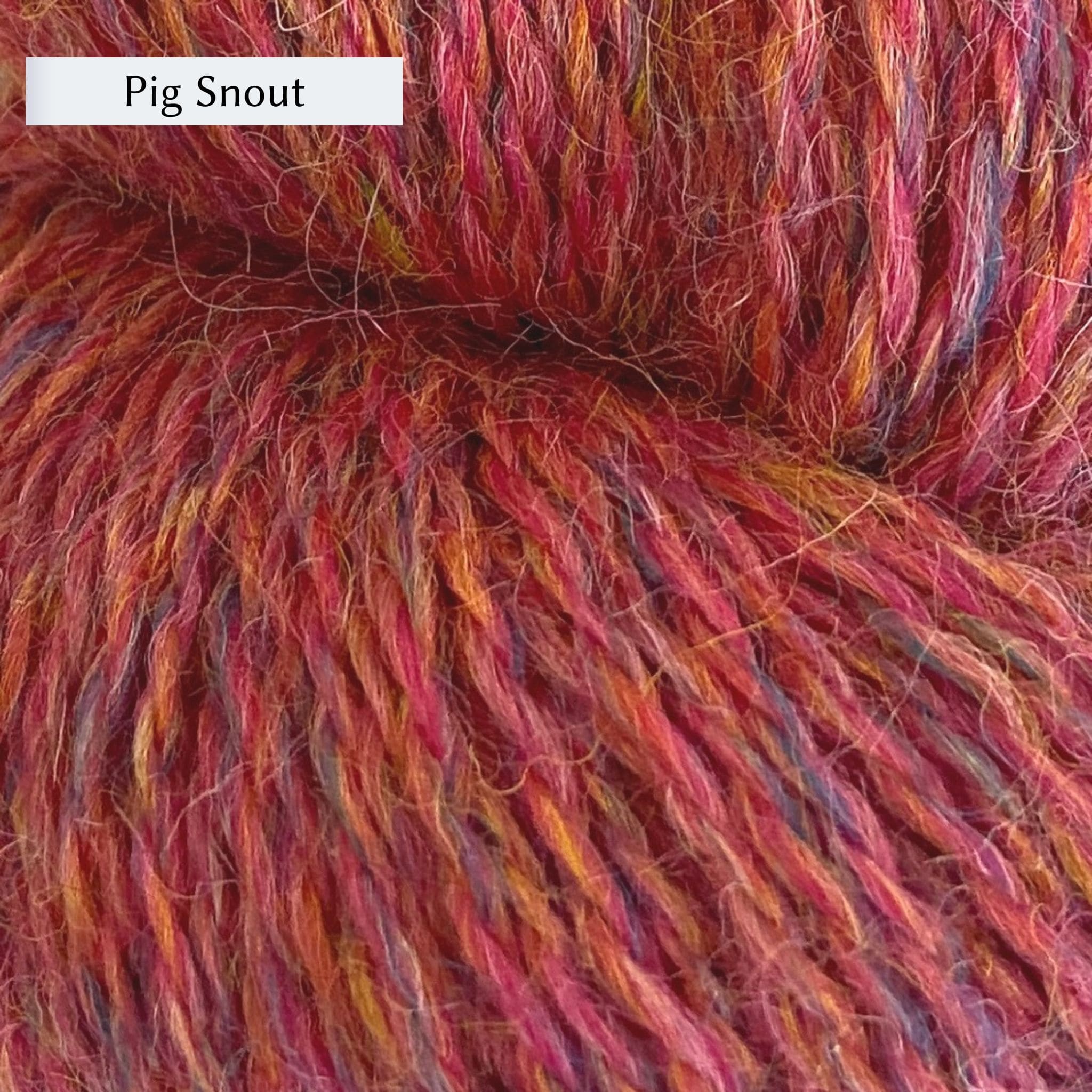John Arbon Appledore DK, a DK weight British yarn, in color Pig Snout, a bright red with yellow and blue heathering