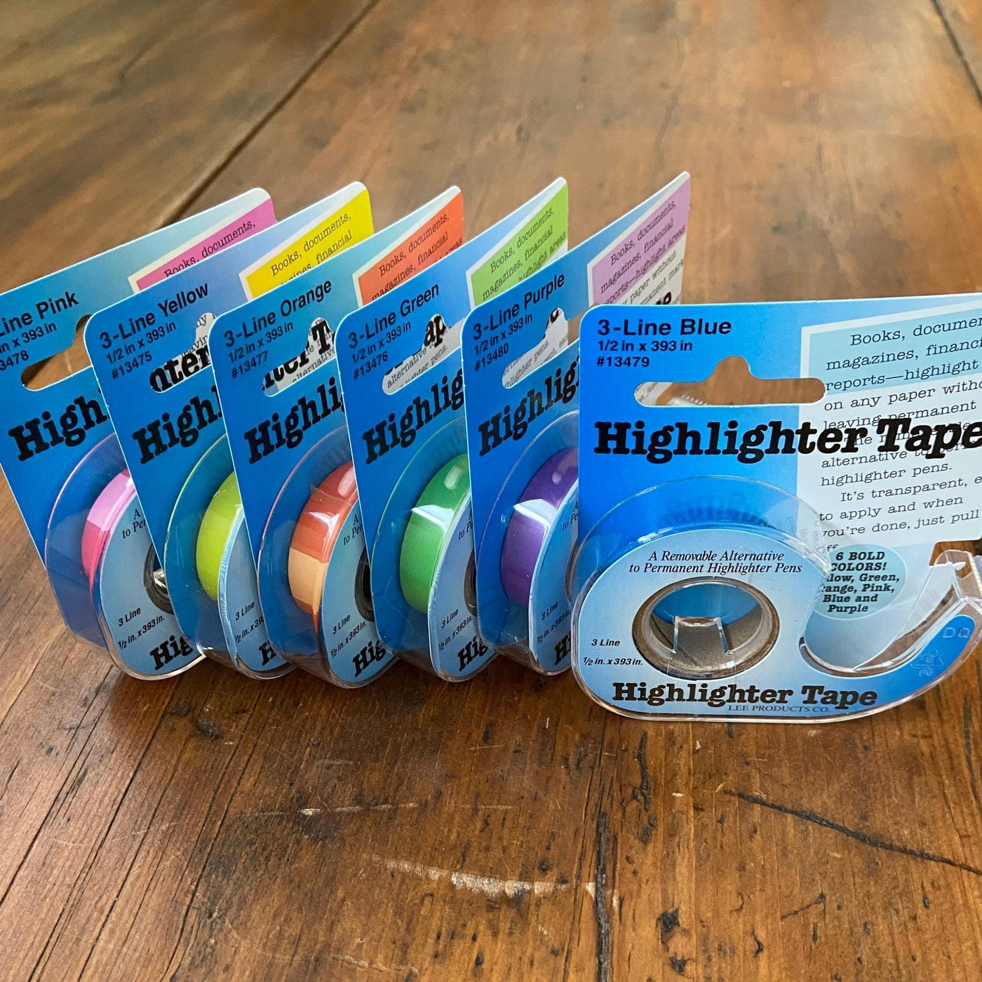 Collection of Highlighter tape in various colors sitting on table i