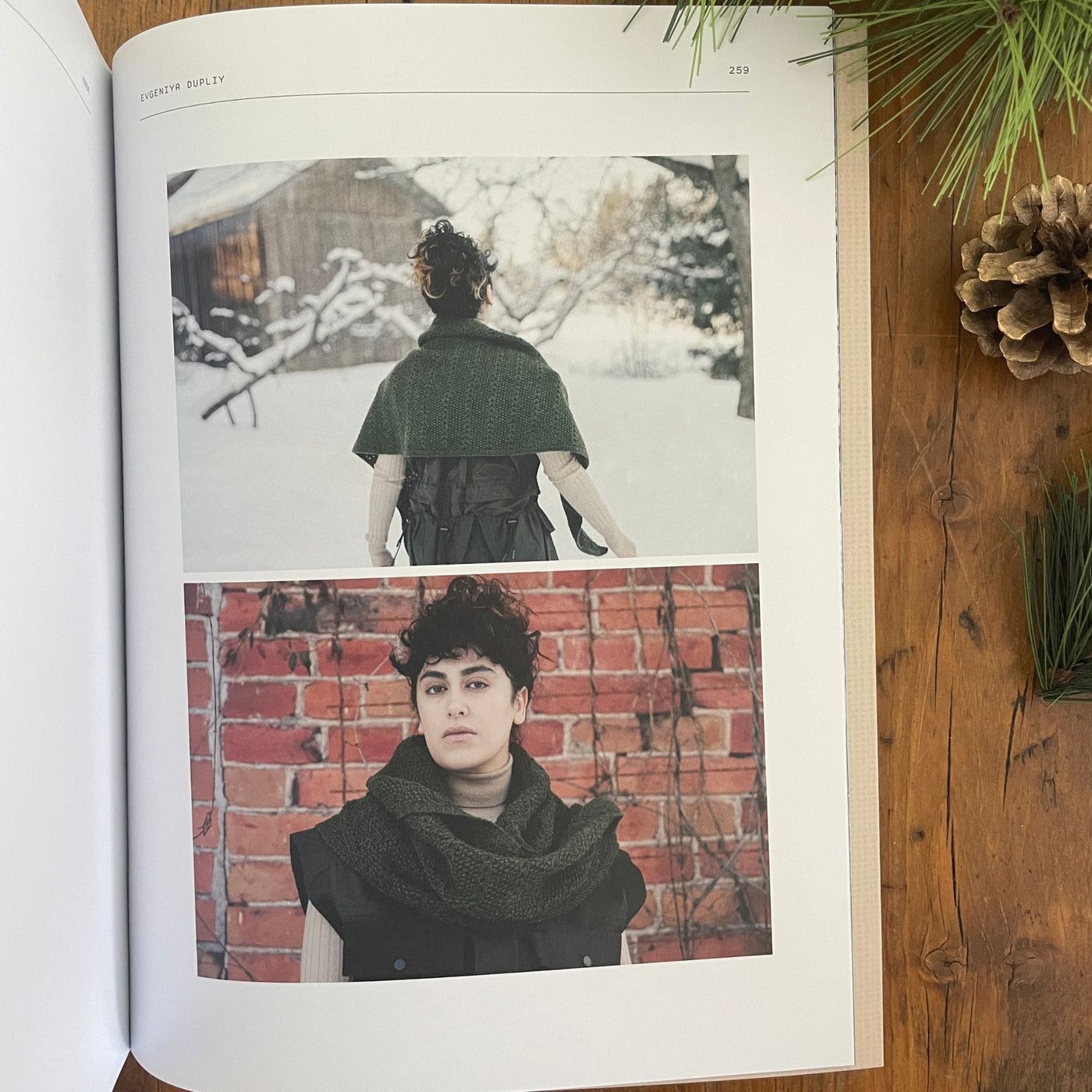 Interior pages from 52 Weeks of Scarves showing two photos pf a dark grey shawl in a winter scene and in front of a brick wall