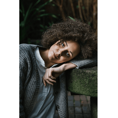 The Woolly Thistle Products Laine Magazine, Issue 11 Summer 2021 Nordic Knit Life woman wearing grey knitted jacket