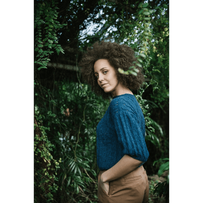 The Woolly Thistle Products Laine Magazine, Issue 11 Summer 2021 Nordic Knit Life featuring woman wearing blue knitted sweater