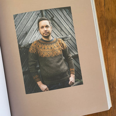 Strands of Joy book page, photo fo man in brown and orange leaf pattern sweater