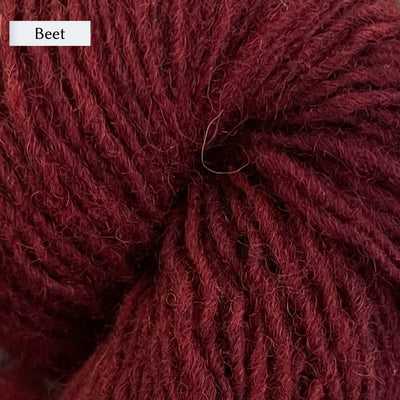 Lichen & Lace Rustic Heather Sport, a sport weight single-ply yarn, in Beet, a rich red