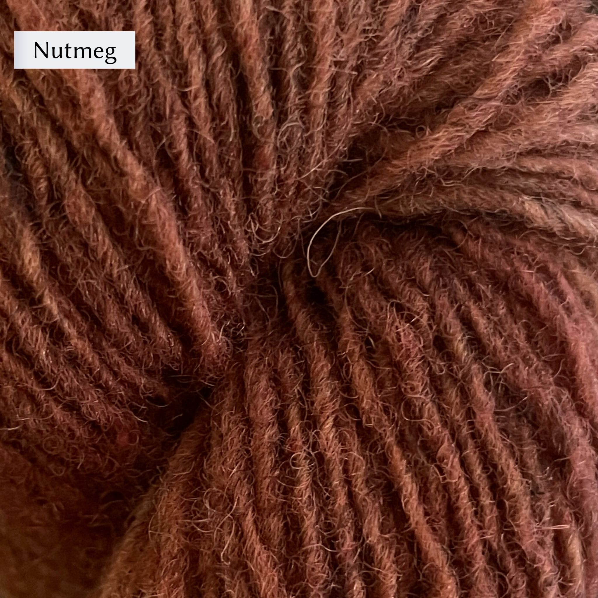 Lichen & Lace Rustic Heather Sport, a sport weight single-ply yarn, a warm medium brown