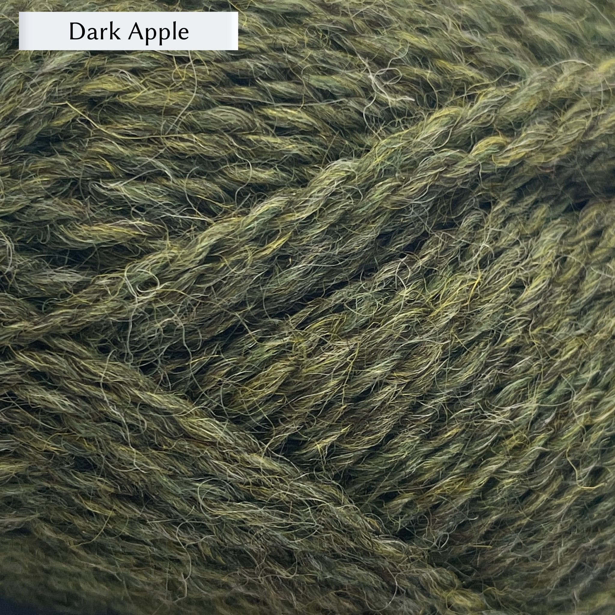 Marie Wallin's British Breeds yarn, a fingering weight, in color Dark Apple, a rich apple green