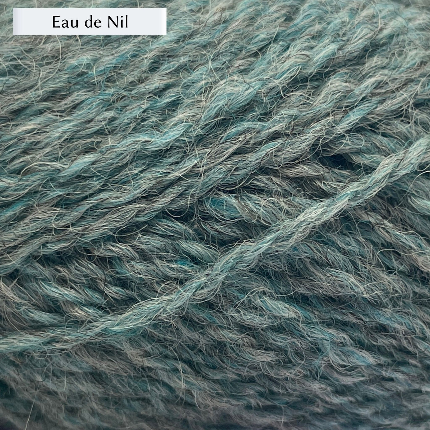 Marie Wallin's British Breeds yarn, a fingering weight, in color Eau de Nil, a light aqua blue