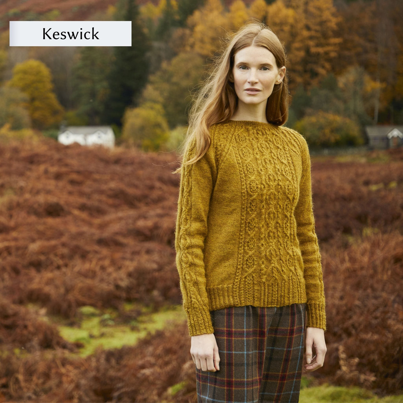 Female model wearing textured sweater design, Keswick, from Westmorland book by Marie Wallin. Sweater is knit in a golden green color.