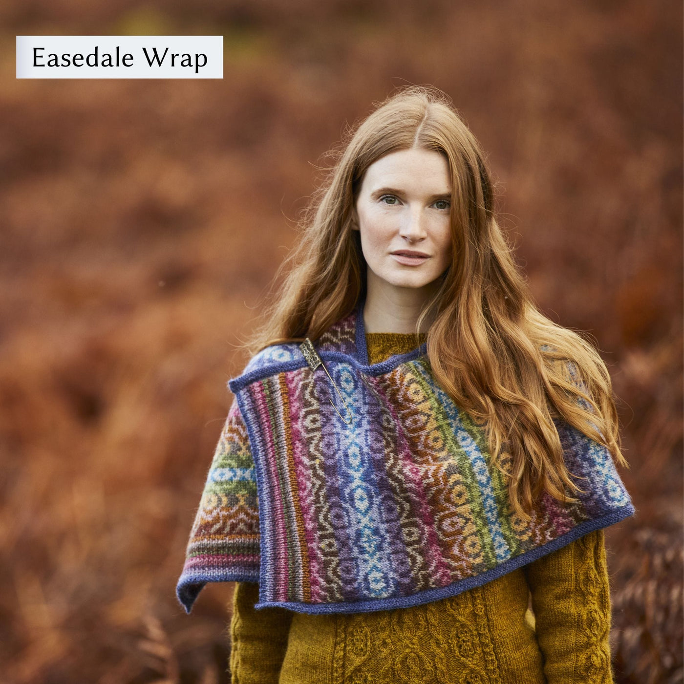 Female model wearing the Easedale Wrap design, which is an allover colorwork design  from Westmorland book by Marie Wallin.