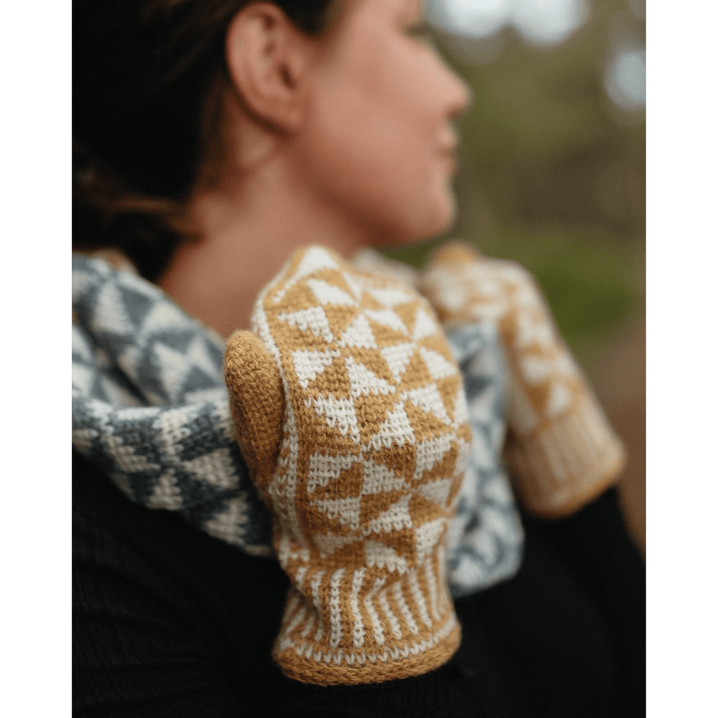 The Woolly Thistle Moorit Magazine - Issue 1 image from magazine showing yellow and white knitted mittens and blue and while knitted scarf