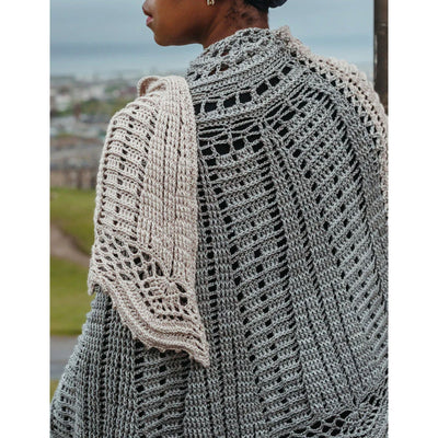 back view of woman wearing Fly Me to the Moon wrap - pattern found in Moorit Magazine Issue 3 - Cosmic.