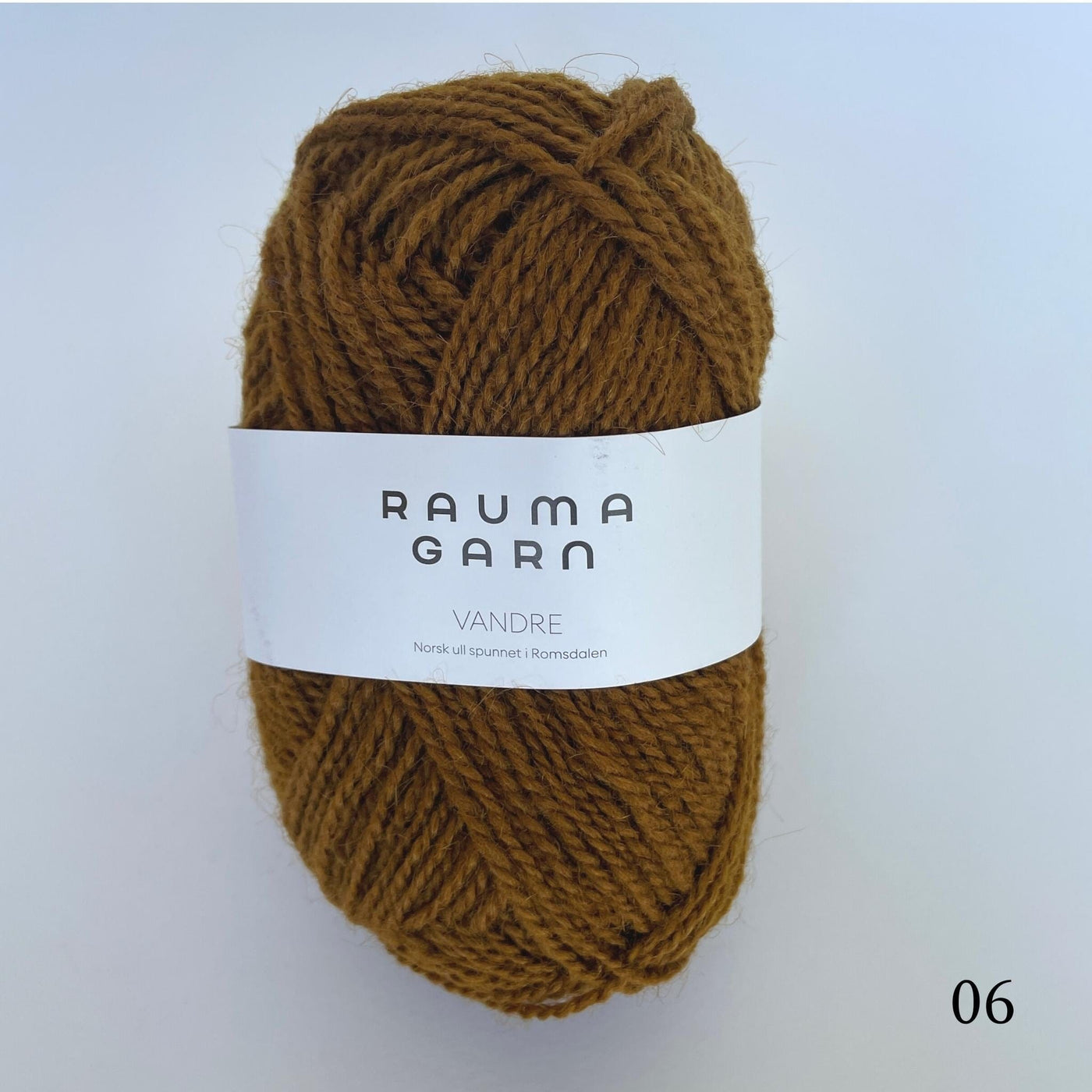 One ball of Rauma Vandre yarn in light brown  color 06